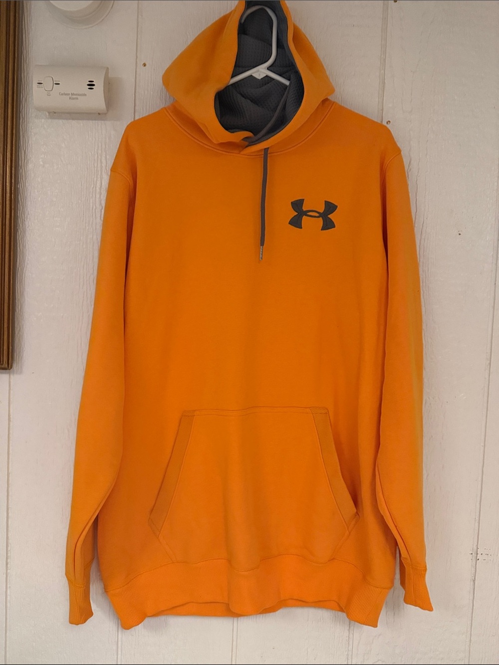 Under Armour Men’s Orange Hooded Pullover with Black Logo